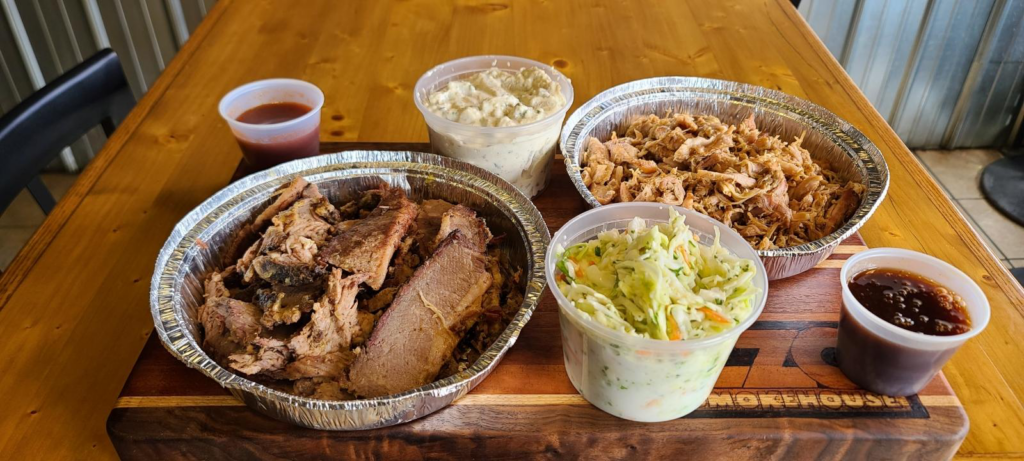 An image of a tray with BBQ and dips