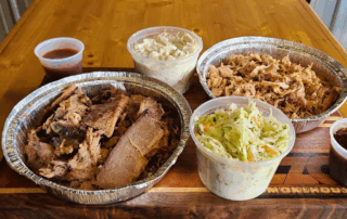 An image of a tray with BBQ and dips