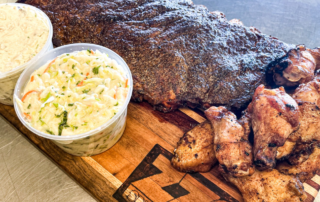 Smoked steak with mashed potatoes and BBQ wings at graduation party catering in Eagan, MN
