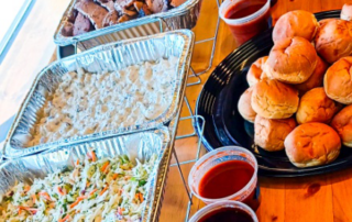 BBQ dishes arranged for a catered event setup in Eagan, MN