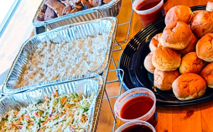 BBQ dishes arranged for a catered event setup in Eagan, MN