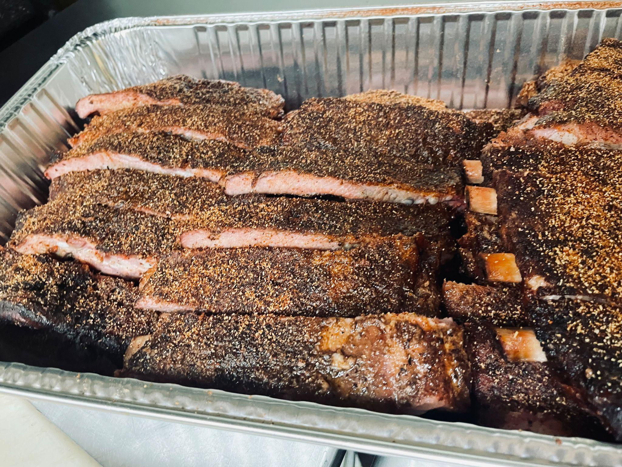 This photo shows some meat on a tray.