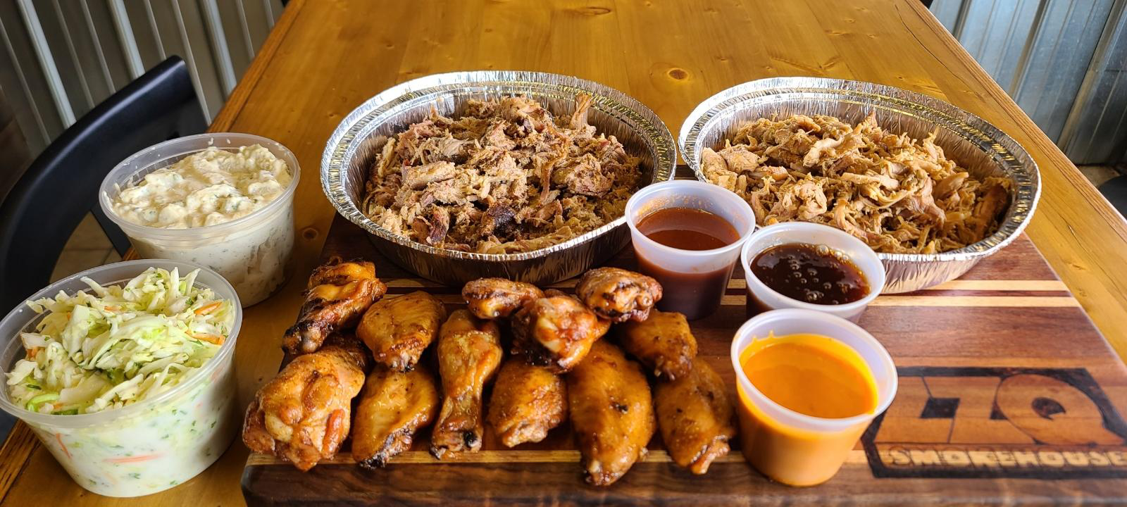 This photo shows an assortment of meats on a table.